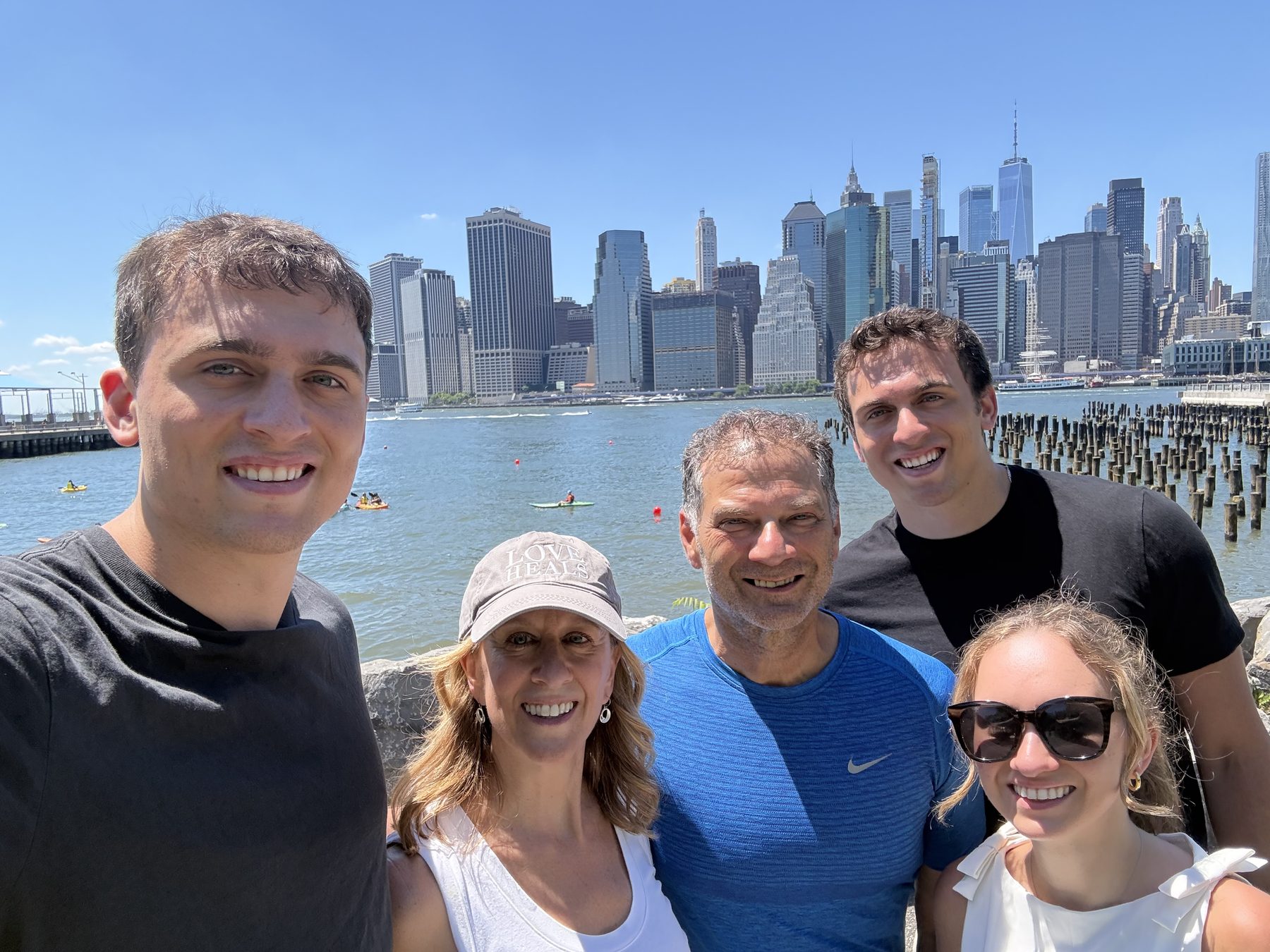 The Batten family in front of the Manhattan skyline